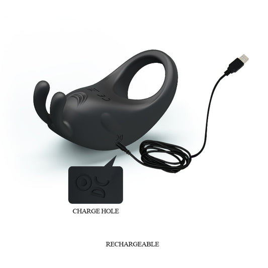 Black wireless cockring with charging cable on a white background