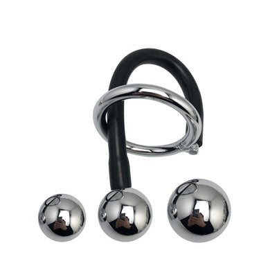 Metallic ball and ring set on a white background