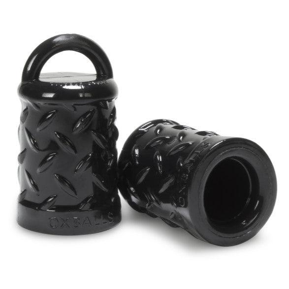 Two black textured rollers on a white background