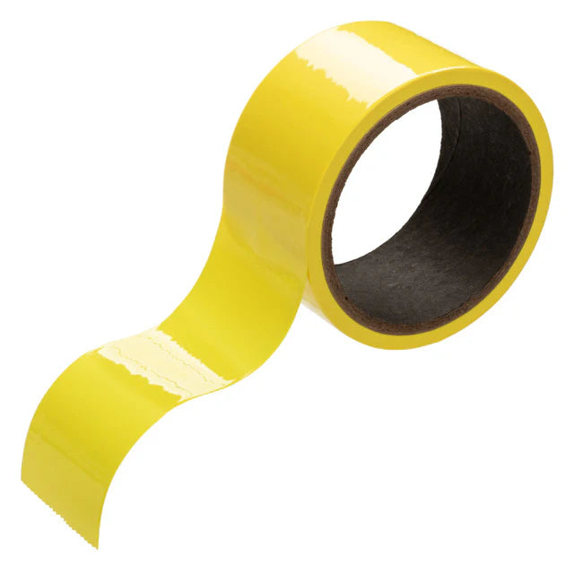 Yellow tape with reflective stripes on a white background