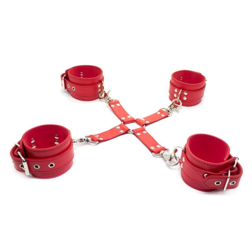 Red leather restraint set with handcuffs and a collar on a white background