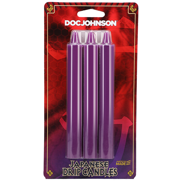 Packaged purple Japanese drip candles with 'Doc Johnson' branding on a red and black background.