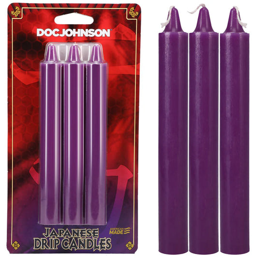 Purple candles with packaging labeled 'Doc Johnson' on a white background