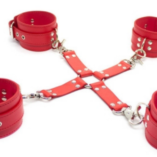 Red leather restraint set with silver hardware on a white background