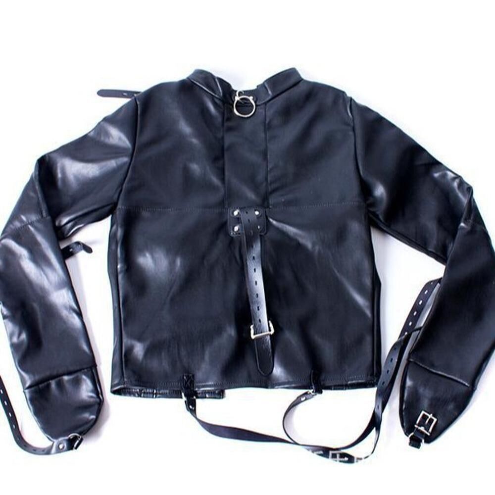 Black faux leather jacket with a high collar, front buckle strap, and shoulder straps, laid flat on a white background.