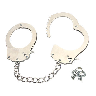 Metallic handcuffs with a chain and keys on a white background