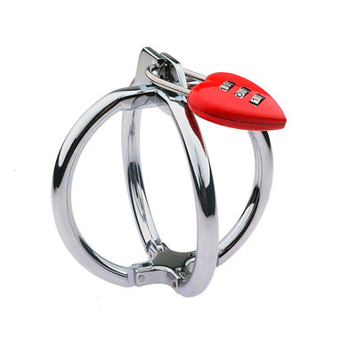 Metal chastity device with a red heart-shaped lock on a white background